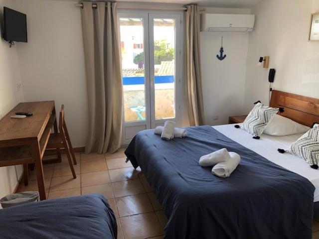 Hotel Le Bleu Marine Сен Мари де ла Мер Екстериор снимка